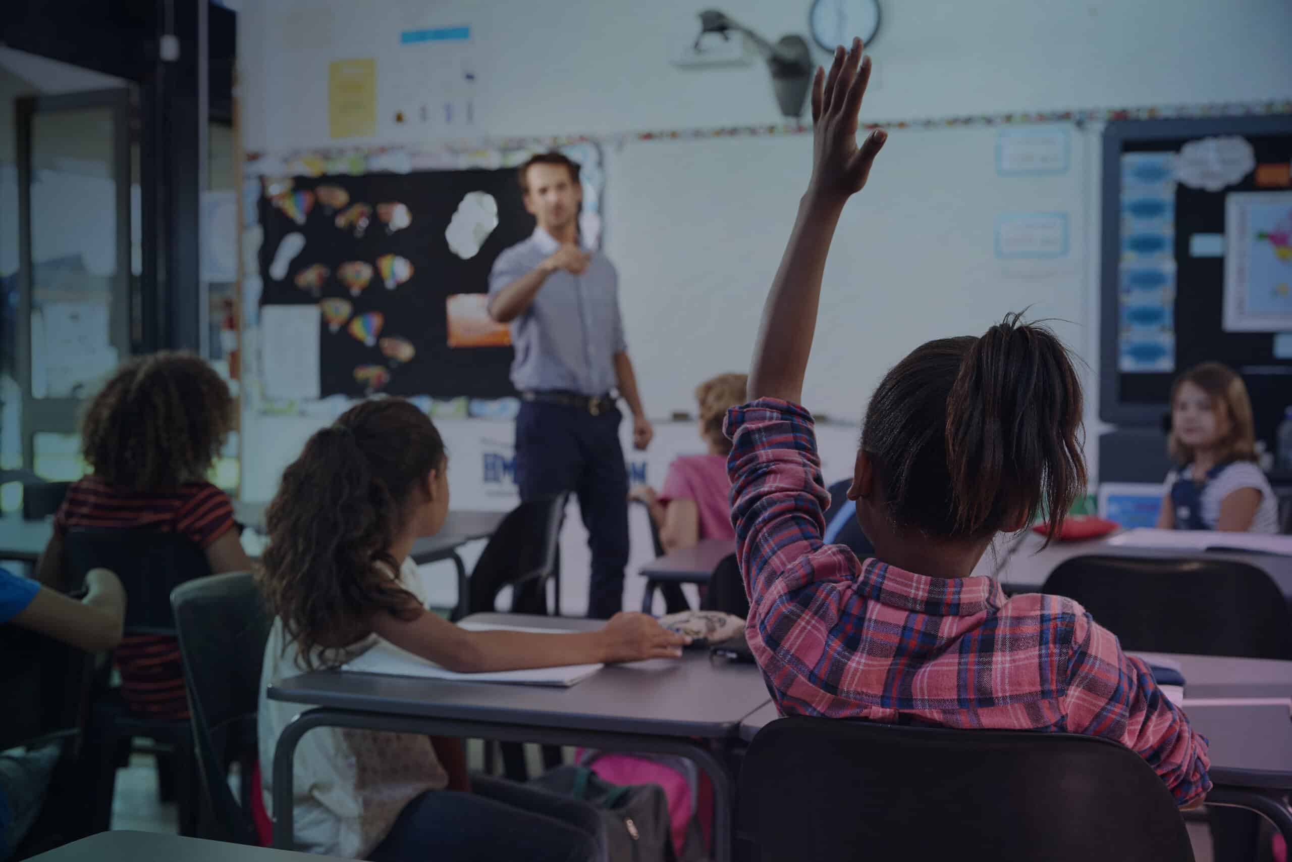 Student raising hand overlay scaled